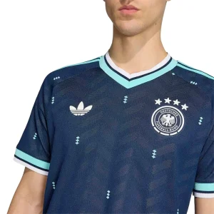 Areena Design <p>Show your support in premium match-day style with the <strong>FIFA World Cup Germany 2026 Authentic Away Jersey</strong>. Featuring a sleek design inspired by Germany’s iconic away look, this authentic jersey offers a lightweight feel and performance fit for match days, training, or everyday fan wear.</p> FIFA World Cup Germany 2026 Authentic Away Jersey <p>Show your support in premium match-day style with the <strong>FIFA World Cup Germany 2026 Authentic Away Jersey</strong>. Featuring a sleek design inspired by Germany’s iconic away look, this authentic jersey offers a lightweight feel and performance fit for match days, training, or everyday fan wear.</p>