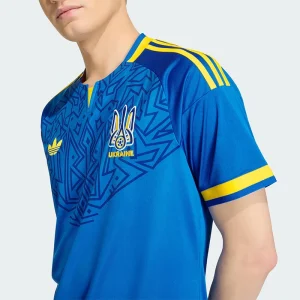 FIFA World Cup Ukraine 2026 Away Authentic Jersey <p>Show your support for Ukraine with the <strong>FIFA World Cup Ukraine 2026 Away Authentic Jersey</strong>. This authentic jersey features Ukraine’s official away colors and crest, offering a perfect blend of style, comfort, and performance. Made with high-quality materials for an elite fit, it’s the ultimate way for passionate fans to cheer on Ukraine during the 2026 World Cup.</p>