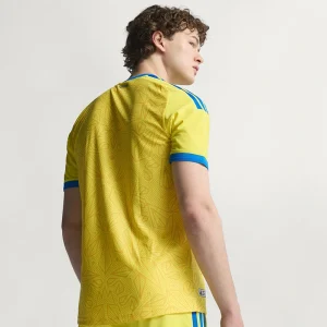 FIFA World Cup Ukraine 2026 Home Jersey <p>Cheer on Ukraine in the <strong>FIFA World Cup Ukraine 2026 Home Jersey</strong>. This jersey showcases Ukraine's vibrant national colors and crest, offering both style and comfort. Made with high-quality materials, it's the perfect choice for passionate fans looking to support their team in the 2026 World Cup with confidence and pride.</p>