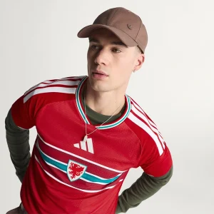 Areena Design <p>Cheer on your team in style with the <strong>FIFA World Cup Wales 2026 Home Authentic Jersey</strong>. Featuring an iconic design inspired by Wales’ legendary home look, this jersey combines a lightweight feel and athletic fit, perfect for match days, training, or everyday fan wear.</p> FIFA World Cup Wales 2026 Home Authentic Jersey <p>Cheer on your team in style with the <strong>FIFA World Cup Wales 2026 Home Authentic Jersey</strong>. Featuring an iconic design inspired by Wales’ legendary home look, this jersey combines a lightweight feel and athletic fit, perfect for match days, training, or everyday fan wear.</p>