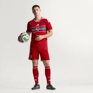 Areena Design <p>Cheer on your team in style with the <strong>FIFA World Cup Wales 2026 Home Authentic Jersey</strong>. Featuring an iconic design inspired by Wales’ legendary home look, this jersey combines a lightweight feel and athletic fit, perfect for match days, training, or everyday fan wear.</p> FIFA World Cup Wales 2026 Home Authentic Jersey <p>Cheer on your team in style with the <strong>FIFA World Cup Wales 2026 Home Authentic Jersey</strong>. Featuring an iconic design inspired by Wales’ legendary home look, this jersey combines a lightweight feel and athletic fit, perfect for match days, training, or everyday fan wear.</p>