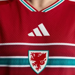 Areena Design <p>Cheer on your team in style with the <strong>FIFA World Cup Wales 2026 Home Authentic Jersey</strong>. Featuring an iconic design inspired by Wales’ legendary home look, this jersey combines a lightweight feel and athletic fit, perfect for match days, training, or everyday fan wear.</p> FIFA World Cup Wales 2026 Home Authentic Jersey <p>Cheer on your team in style with the <strong>FIFA World Cup Wales 2026 Home Authentic Jersey</strong>. Featuring an iconic design inspired by Wales’ legendary home look, this jersey combines a lightweight feel and athletic fit, perfect for match days, training, or everyday fan wear.</p>