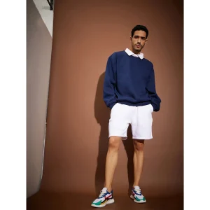 Collared Sweatshirt <p><strong>Collared Sweatshirt</strong>: A comfortable sweatshirt with a classic collar, offering a sophisticated touch to casual wear.</p>