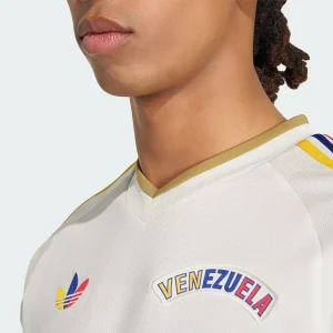 Areena Design <p>A FIFA World Cup Venezuela 2026 away jersey designed with vibrant national details and performance comfort for fans.</p> FIFA World Cup Venezuela 2026 Away Jersey <p>A FIFA World Cup Venezuela 2026 away jersey designed with vibrant national details and performance comfort for fans.</p>