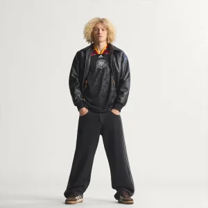 Areena Design <p>A remixed Germany jersey featuring creative design cues and comfortable performance fabric for casual and fan wear.</p> Mens Bringback Remixed Germany Jersey <p>A remixed Germany jersey featuring creative design cues and comfortable performance fabric for casual and fan wear.</p>