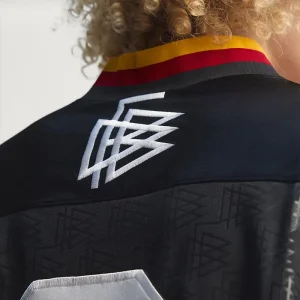 Areena Design <p>A remixed Germany jersey featuring creative design cues and comfortable performance fabric for casual and fan wear.</p> Mens Bringback Remixed Germany Jersey <p>A remixed Germany jersey featuring creative design cues and comfortable performance fabric for casual and fan wear.</p>