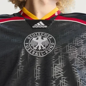 Areena Design <p>A remixed Germany jersey featuring creative design cues and comfortable performance fabric for casual and fan wear.</p> Mens Bringback Remixed Germany Jersey <p>A remixed Germany jersey featuring creative design cues and comfortable performance fabric for casual and fan wear.</p>