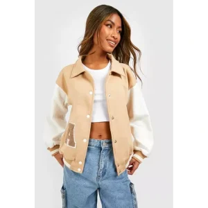 Varsity Bomber Jacket <p>Varsity bomber jacket with a classic athletic-inspired look and everyday comfort. A timeless layer for casual outfits with a sporty edge.</p>