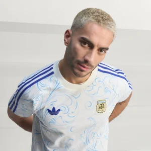 Areena Design <p>Adidas Argentina Originals All Over Print T-Shirt brings sports and fanwear styling to a comfortable shirt made for game days, fan events, training-inspired outfits, and casual weekends. Easy to style and strong for casual, fan, and streetwear outfits.</p> Adidas Argentina Originals All Over Print T-Shirt <p>Adidas Argentina Originals All Over Print T-Shirt brings sports and fanwear styling to a comfortable shirt made for game days, fan events, training-inspired outfits, and casual weekends. Easy to style and strong for casual, fan, and streetwear outfits.</p>