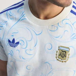 Areena Design <p>Adidas Argentina Originals All Over Print T-Shirt brings sports and fanwear styling to a comfortable shirt made for game days, fan events, training-inspired outfits, and casual weekends. Easy to style and strong for casual, fan, and streetwear outfits.</p> Adidas Argentina Originals All Over Print T-Shirt <p>Adidas Argentina Originals All Over Print T-Shirt brings sports and fanwear styling to a comfortable shirt made for game days, fan events, training-inspired outfits, and casual weekends. Easy to style and strong for casual, fan, and streetwear outfits.</p>