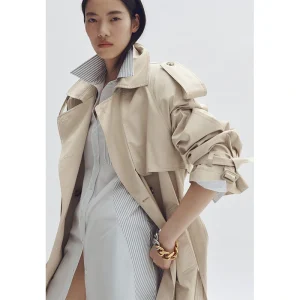 Areena Design <p>H&M x Stella McCartney Women's Oversized Trench Coat brings premium streetwear styling to a comfortable jacket made for streetwear rotations, layered outfits, and elevated casual styling. Easy to style and strong for casual, fan, and streetwear outfits.</p> H&M x Stella McCartney Women's Oversized Trench Coat <p>H&M x Stella McCartney Women's Oversized Trench Coat brings premium streetwear styling to a comfortable jacket made for streetwear rotations, layered outfits, and elevated casual styling. Easy to style and strong for casual, fan, and streetwear outfits.</p>