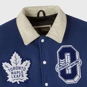 Areena Design <p>Mens Toronto Maple Leafs x OVO Varsity Jacket delivers premium outerwear comfort, versatile layering, and standout fashion appeal.</p> Mens Toronto Maple Leafs x OVO Varsity Jacket <p>Mens Toronto Maple Leafs x OVO Varsity Jacket delivers premium outerwear comfort, versatile layering, and standout fashion appeal.</p>