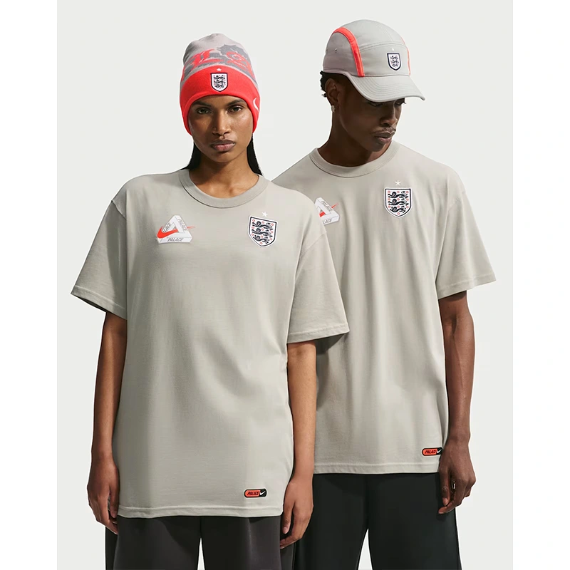 England x Palace Grey T-Shirt 2 England x Palace Grey T-Shirt <p>England x Palace Grey T-Shirt adds an easy everyday top to your wardrobe with clean, versatile styling. It is ideal for casual outfits, training-inspired looks, layered streetwear, and warm-weather styling.</p>