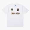 Areena Design <p>FIFA UNDEFEATED X USSF X NWSL ANGEL CITY FC S/S TEE delivers graphic fan style with easy everyday wearability, inspired by U.S. Soccer federation culture and Angel City FC supporter culture. A versatile short-sleeve tee for match days, streetwear looks, travel and everyday casual wear.</p> FIFA UNDEFEATED X USSF X MLS LAFC S/S TEE <p>FIFA UNDEFEATED X USSF X NWSL ANGEL CITY FC S/S TEE delivers graphic fan style with easy everyday wearability, inspired by U.S. Soccer federation culture and Angel City FC supporter culture. A versatile short-sleeve tee for match days, streetwear looks, travel and everyday casual wear.</p>