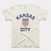 Areena Design <p>Fifa Kansas City U.S. Soccer Navy Letterman Jacket delivers sporty outerwear style with easy streetwear versatility, inspired by Kansas City local pride and global football culture. A versatile letterman jacket for match days, streetwear looks, travel and everyday casual wear.</p> Fifa Kansas City U.S. Soccer Vintage White Tee <p>Fifa Kansas City U.S. Soccer Navy Letterman Jacket delivers sporty outerwear style with easy streetwear versatility, inspired by Kansas City local pride and global football culture. A versatile letterman jacket for match days, streetwear looks, travel and everyday casual wear.</p>