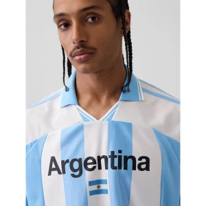 Areena Design <p>Add standout sports and culture-inspired style to your rotation with the GAP x FIFA World Cup 2026 Argentina Oversized Jersey. Its oversized jersey format makes it a versatile choice for supporters, collectors, gifting, travel, and relaxed everyday dressing.</p> GAP x FIFA World Cup 2026 Argentina Oversized Jersey <p>Add standout sports and culture-inspired style to your rotation with the GAP x FIFA World Cup 2026 Argentina Oversized Jersey. Its oversized jersey format makes it a versatile choice for supporters, collectors, gifting, travel, and relaxed everyday dressing.</p>