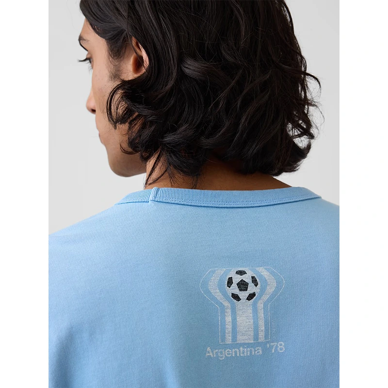 GAP x FIFA World Cup 2026 Argentina Relaxed Graphic T-Shirt 4 GAP x FIFA World Cup 2026 Argentina Relaxed Graphic T-Shirt <p>The GAP x FIFA World Cup 2026 Argentina Relaxed Graphic T-Shirt delivers a recognizable Argentina look in a wearable graphic T-shirt silhouette. Style it for watch parties, events, weekends, or daily streetwear with denim, joggers, sneakers, and simple neutral layers.</p>
