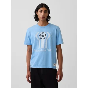 Areena Design <p>The GAP x FIFA World Cup 2026 Argentina Relaxed Graphic T-Shirt delivers a recognizable Argentina look in a wearable graphic T-shirt silhouette. Style it for watch parties, events, weekends, or daily streetwear with denim, joggers, sneakers, and simple neutral layers.</p> GAP x FIFA World Cup 2026 Argentina Relaxed Graphic T-Shirt <p>The GAP x FIFA World Cup 2026 Argentina Relaxed Graphic T-Shirt delivers a recognizable Argentina look in a wearable graphic T-shirt silhouette. Style it for watch parties, events, weekends, or daily streetwear with denim, joggers, sneakers, and simple neutral layers.</p>