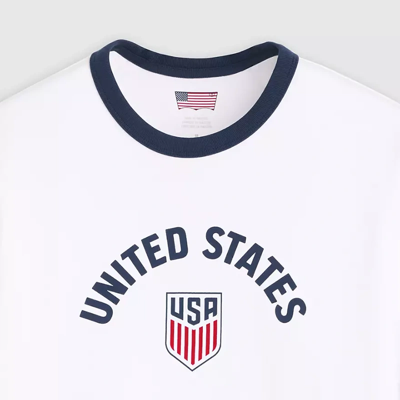 Levi's US Soccer Retro Ringer Tee 1 Levi's US Soccer Retro Ringer Tee <p>Levi's US Soccer Retro Ringer Tee delivers graphic fan style with easy everyday wearability, inspired by U.S. Soccer supporter culture. A versatile tee for match days, streetwear looks, travel and everyday casual wear.</p>