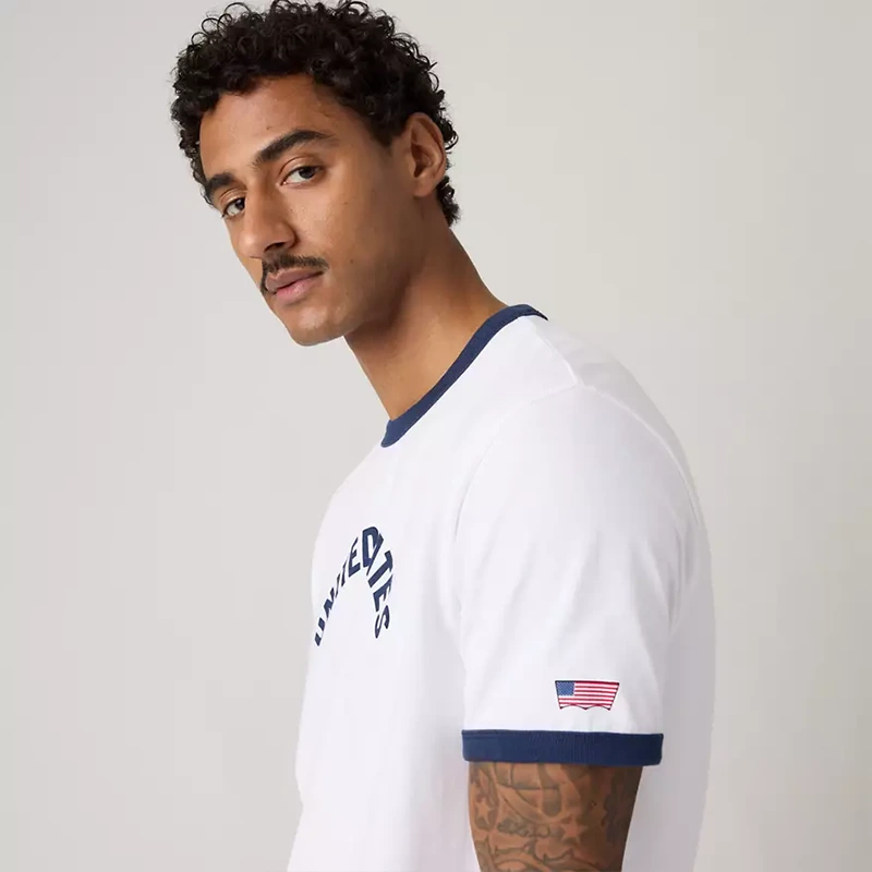 Levi's US Soccer Retro Ringer Tee 5 Levi's US Soccer Retro Ringer Tee <p>Levi's US Soccer Retro Ringer Tee delivers graphic fan style with easy everyday wearability, inspired by U.S. Soccer supporter culture. A versatile tee for match days, streetwear looks, travel and everyday casual wear.</p>