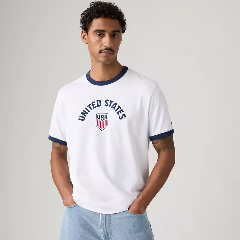 Levi's US Soccer Retro Ringer Tee 6 Levi's US Soccer Retro Ringer Tee <p>Levi's US Soccer Retro Ringer Tee delivers graphic fan style with easy everyday wearability, inspired by U.S. Soccer supporter culture. A versatile tee for match days, streetwear looks, travel and everyday casual wear.</p>