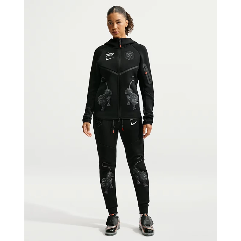 Netherlands x Patta Tech Fleece Full-Zip Windrunner Hoodie 8 Netherlands x Patta Tech Fleece Full-Zip Windrunner Hoodie <p>Netherlands x Patta Tech Fleece Full-Zip Windrunner Hoodie brings a bold outerwear look to casual and streetwear outfits. Wear it for daily layering, night-out outfits, travel looks, and streetwear styling.</p>