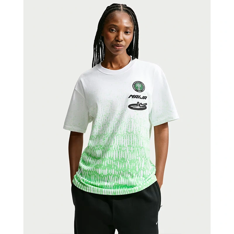Nigeria x Slawn T-Shirt 2 Nigeria x Slawn T-Shirt <p>Nigeria x Slawn T-Shirt adds an easy everyday top to your wardrobe with clean, versatile styling. It is ideal for casual outfits, training-inspired looks, layered streetwear, and warm-weather styling.</p>