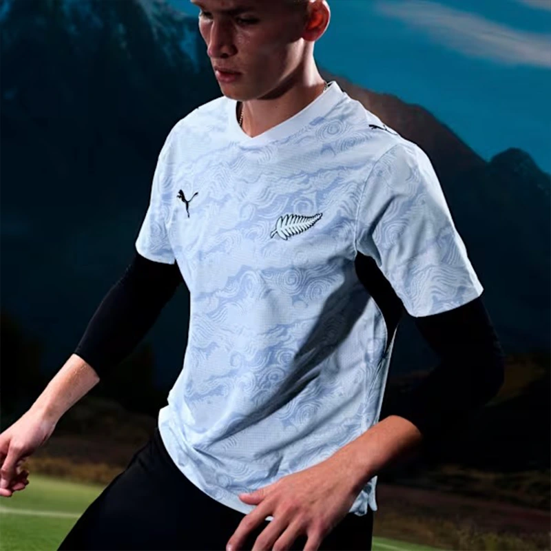 Puma FIFA 26 New Zealand Away Jersey 2 Puma FIFA 26 New Zealand Away Jersey <p><strong>Puma FIFA 26 New Zealand Away Jersey</strong> brings football-inspired style into match days, casual outfits, travel and gifting. Pair it with shorts, denim, cargos, track pants or a light overshirt for an easy supporter look.</p>