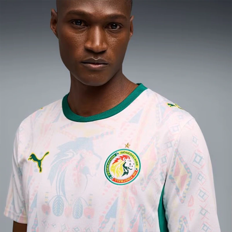 Puma FIFA 26 Senegal Away Jersey 5 Puma FIFA 26 Senegal Away Jersey <p><strong>Puma FIFA 26 Senegal Away Jersey</strong> brings football-inspired style into match days, casual outfits, travel and gifting. Pair it with shorts, denim, cargos, track pants or a light overshirt for an easy supporter look.</p>