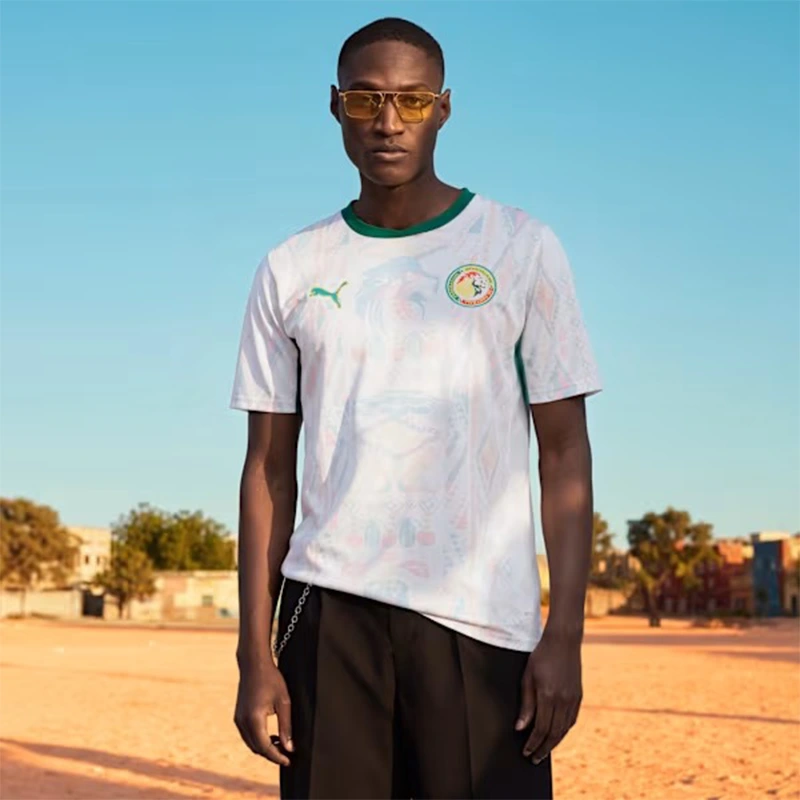 Puma FIFA 26 Senegal Away Jersey 6 Puma FIFA 26 Senegal Away Jersey <p><strong>Puma FIFA 26 Senegal Away Jersey</strong> brings football-inspired style into match days, casual outfits, travel and gifting. Pair it with shorts, denim, cargos, track pants or a light overshirt for an easy supporter look.</p>