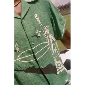 Areena Design <p><strong>Tombolo FIFA World Cup 2026 Excessive Celebration Zipper Shirt</strong> brings football-inspired style into match days, casual outfits, travel and gifting. Pair it with shorts, denim, cargos, track pants or a light overshirt for an easy supporter look.</p> Tombolo FIFA World Cup 2026 Excessive Celebration Zipper Shirt <p><strong>Tombolo FIFA World Cup 2026 Excessive Celebration Zipper Shirt</strong> brings football-inspired style into match days, casual outfits, travel and gifting. Pair it with shorts, denim, cargos, track pants or a light overshirt for an easy supporter look.</p>