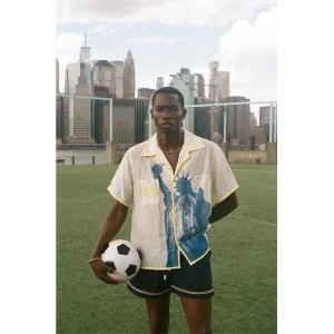Areena Design <p><strong>Tombolo FIFA World Cup 2026 Lady Liberty Button-up Shirt</strong> brings football-inspired style into match days, casual outfits, travel and gifting. Pair it with shorts, denim, cargos, track pants or a light overshirt for an easy supporter look.</p> Tombolo FIFA World Cup 2026 Lady Liberty Button-up Shirt <p><strong>Tombolo FIFA World Cup 2026 Lady Liberty Button-up Shirt</strong> brings football-inspired style into match days, casual outfits, travel and gifting. Pair it with shorts, denim, cargos, track pants or a light overshirt for an easy supporter look.</p>