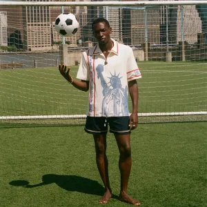 Areena Design <p><strong>Tombolo FIFA World Cup 2026 Liberty Cabana (Captain's Armband) Zipper Shirt</strong> brings football-inspired style into match days, casual outfits, travel and gifting. Pair it with shorts, denim, cargos, track pants or a light overshirt for an easy supporter look.</p> Tombolo FIFA World Cup 2026 Liberty Cabana (Captain's Armband) Zipper Shirt <p><strong>Tombolo FIFA World Cup 2026 Liberty Cabana (Captain's Armband) Zipper Shirt</strong> brings football-inspired style into match days, casual outfits, travel and gifting. Pair it with shorts, denim, cargos, track pants or a light overshirt for an easy supporter look.</p>