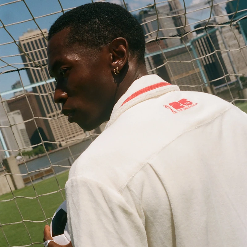 Tombolo FIFA World Cup 2026 Liberty Cabana (Captain’s Armband) Zipper Shirt 5 Tombolo FIFA World Cup 2026 Liberty Cabana (Captain's Armband) Zipper Shirt <p><strong>Tombolo FIFA World Cup 2026 Liberty Cabana (Captain's Armband) Zipper Shirt</strong> brings football-inspired style into match days, casual outfits, travel and gifting. Pair it with shorts, denim, cargos, track pants or a light overshirt for an easy supporter look.</p>