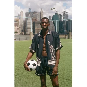 Areena Design <p><strong>Tombolo FIFA World Cup 2026 Stars and Stripes Zipper Shirt</strong> brings football-inspired style into match days, casual outfits, travel and gifting. Pair it with shorts, denim, cargos, track pants or a light overshirt for an easy supporter look.</p> Tombolo FIFA World Cup 2026 Stars and Stripes Zipper Shirt <p><strong>Tombolo FIFA World Cup 2026 Stars and Stripes Zipper Shirt</strong> brings football-inspired style into match days, casual outfits, travel and gifting. Pair it with shorts, denim, cargos, track pants or a light overshirt for an easy supporter look.</p>