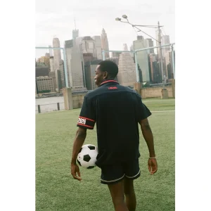 Areena Design <p><strong>Tombolo FIFA World Cup 2026 USA Cabana (Captain’s Armband) Shirt</strong> brings football-inspired style into match days, casual outfits, travel and gifting. Pair it with shorts, denim, cargos, track pants or a light overshirt for an easy supporter look.</p> Tombolo FIFA World Cup 2026 USA Cabana (Captain’s Armband) Shirt <p><strong>Tombolo FIFA World Cup 2026 USA Cabana (Captain’s Armband) Shirt</strong> brings football-inspired style into match days, casual outfits, travel and gifting. Pair it with shorts, denim, cargos, track pants or a light overshirt for an easy supporter look.</p>