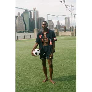 Areena Design <p><strong>Tombolo FIFA World Cup 2026 USA Cabana (Captain’s Armband) Shirt</strong> brings football-inspired style into match days, casual outfits, travel and gifting. Pair it with shorts, denim, cargos, track pants or a light overshirt for an easy supporter look.</p> Tombolo FIFA World Cup 2026 USA Cabana (Captain’s Armband) Shirt <p><strong>Tombolo FIFA World Cup 2026 USA Cabana (Captain’s Armband) Shirt</strong> brings football-inspired style into match days, casual outfits, travel and gifting. Pair it with shorts, denim, cargos, track pants or a light overshirt for an easy supporter look.</p>