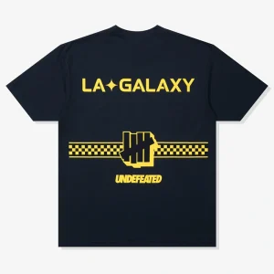 Areena Design <p>UNDEFEATED X USSF X MLS LA GALAXY TEE delivers graphic fan style with easy everyday wearability, inspired by U.S. Soccer federation culture and LA Galaxy supporter culture. A versatile tee for match days, streetwear looks, travel and everyday casual wear.</p> UNDEFEATED X USSF X MLS LA GALAXY TEE <p>UNDEFEATED X USSF X MLS LA GALAXY TEE delivers graphic fan style with easy everyday wearability, inspired by U.S. Soccer federation culture and LA Galaxy supporter culture. A versatile tee for match days, streetwear looks, travel and everyday casual wear.</p>