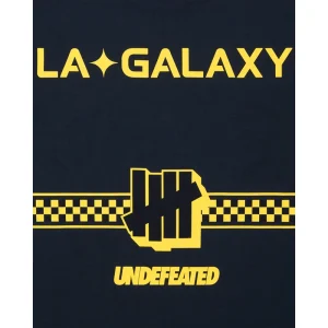 Areena Design <p>UNDEFEATED X USSF X MLS LA GALAXY TEE delivers graphic fan style with easy everyday wearability, inspired by U.S. Soccer federation culture and LA Galaxy supporter culture. A versatile tee for match days, streetwear looks, travel and everyday casual wear.</p> UNDEFEATED X USSF X MLS LA GALAXY TEE <p>UNDEFEATED X USSF X MLS LA GALAXY TEE delivers graphic fan style with easy everyday wearability, inspired by U.S. Soccer federation culture and LA Galaxy supporter culture. A versatile tee for match days, streetwear looks, travel and everyday casual wear.</p>