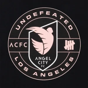 Areena Design <p>UNDEFEATED X USSF X NWSL ANGEL CITY FC TEE delivers graphic fan style with easy everyday wearability, inspired by U.S. Soccer federation culture and Angel City FC supporter culture. A versatile tee for match days, streetwear looks, travel and everyday casual wear.</p> UNDEFEATED X USSF X NWSL ANGEL CITY FC TEE <p>UNDEFEATED X USSF X NWSL ANGEL CITY FC TEE delivers graphic fan style with easy everyday wearability, inspired by U.S. Soccer federation culture and Angel City FC supporter culture. A versatile tee for match days, streetwear looks, travel and everyday casual wear.</p>