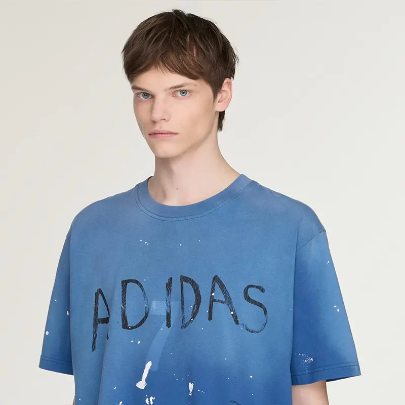 Adidas x Song For The Mute 007 Dusky Petrol Short Sleeve Tee Adidas x Song For The Mute 007 Dusky Petrol Short Sleeve Tee <p><strong>Adidas x Song For The Mute 007 Dusky Petrol Short Sleeve Tee</strong> delivers a casual statement t-shirt look for streetwear outfits, relaxed days, travel, and everyday wear. Its distinctive design offers easy outfit pairing, versatile styling, and standout graphic appeal, making it a strong choice for personal wardrobes, collections, or gifting.</p>