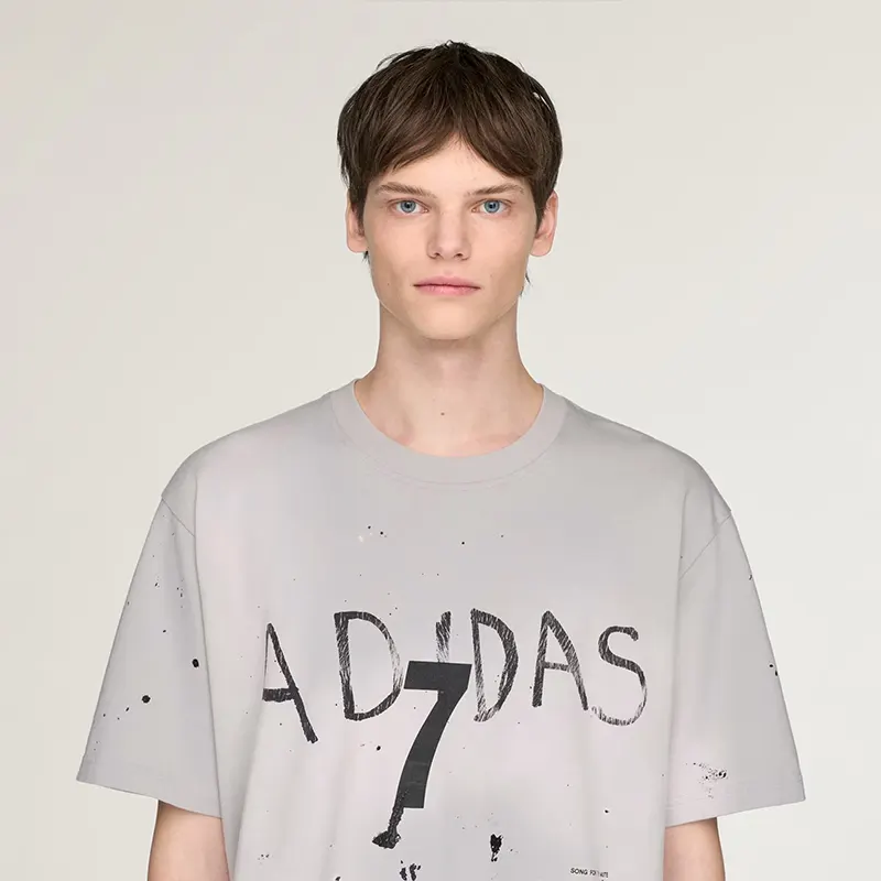 Adidas x Song For The Mute 007 Short Sleeve Tee 3 Adidas x Song For The Mute 007 Short Sleeve Tee <p><strong>Adidas x Song For The Mute 007 Short Sleeve Tee</strong> delivers a casual statement t-shirt look for streetwear outfits, relaxed days, travel, and everyday wear. Its distinctive design offers easy outfit pairing, versatile styling, and standout graphic appeal, making it a strong choice for personal wardrobes, collections, or gifting.</p>