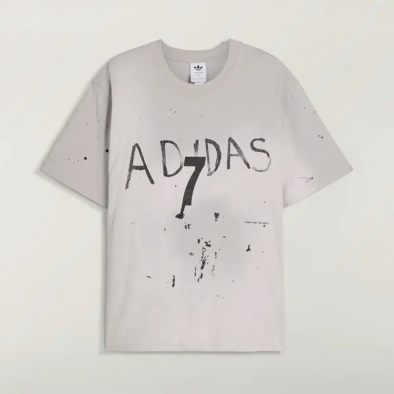 Adidas x Song For The Mute 007 Short Sleeve Tee 8 Adidas x Song For The Mute 007 Short Sleeve Tee <p><strong>Adidas x Song For The Mute 007 Short Sleeve Tee</strong> delivers a casual statement t-shirt look for streetwear outfits, relaxed days, travel, and everyday wear. Its distinctive design offers easy outfit pairing, versatile styling, and standout graphic appeal, making it a strong choice for personal wardrobes, collections, or gifting.</p>