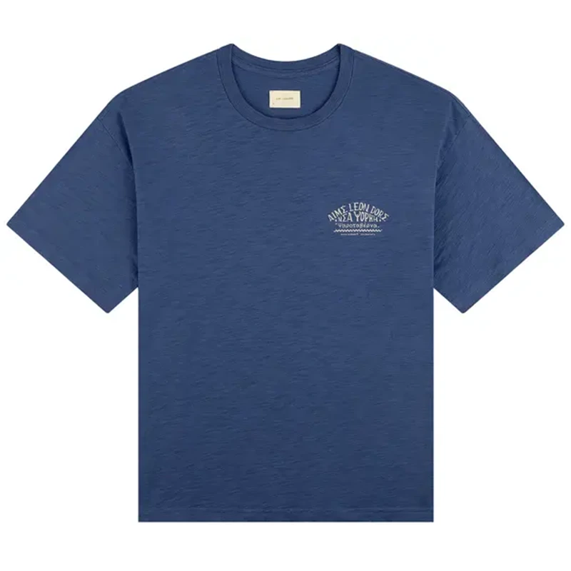 Aimé Leon Dore Taverna Coastal Fjord Tee Aimé Leon Dore Taverna Coastal Fjord Tee <p><strong>Aimé Leon Dore Taverna Coastal Fjord Tee</strong> delivers a casual statement t-shirt look for streetwear outfits, relaxed days, travel, and everyday wear. Its distinctive design offers easy outfit pairing, versatile styling, and standout graphic appeal, making it a strong choice for personal wardrobes, collections, or gifting.</p>