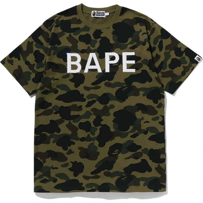 BAPE 1st Camo Rhinestone Tee 2 BAPE 1st Camo Rhinestone Tee <p><strong>BAPE 1st Camo Rhinestone Tee</strong> delivers a casual statement t-shirt look for streetwear outfits, relaxed days, travel, and everyday wear. Its distinctive design offers easy outfit pairing, versatile styling, and standout graphic appeal, making it a strong choice for personal wardrobes, collections, or gifting.</p>