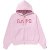 Areena Design <p><strong>BAPE ABC Camo Shark Full Zip Hoodie</strong> delivers a versatile zip-front zip hoodie look for casual outfits, travel, quick layering, and relaxed streetwear looks. Its distinctive design offers easy on-and-off wear, flexible layering, and standout casual style, making it a strong choice for personal wardrobes, collections, or gifting.</p> BAPE ABC Pink Camo Crystal Logo Wide Zip Hoodie <p><strong>BAPE ABC Camo Shark Full Zip Hoodie</strong> delivers a versatile zip-front zip hoodie look for casual outfits, travel, quick layering, and relaxed streetwear looks. Its distinctive design offers easy on-and-off wear, flexible layering, and standout casual style, making it a strong choice for personal wardrobes, collections, or gifting.</p>