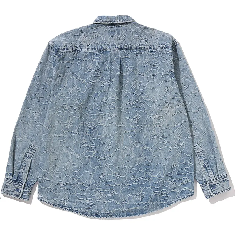BAPE One Point Line Camo Jacquard Denim Shirt 1 BAPE One Point Line Camo Jacquard Denim Shirt <p><strong>BAPE One Point Line Camo Jacquard Denim Shirt</strong> delivers a versatile shirt look for casual outfits, smart-casual looks, travel, and everyday styling. Its distinctive design offers easy outfit coordination, flexible wear, and distinctive visual appeal, making it a strong choice for personal wardrobes, collections, or gifting.</p>