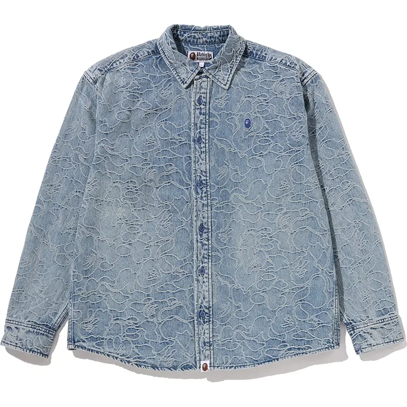 BAPE One Point Line Camo Jacquard Denim Shirt 2 BAPE One Point Line Camo Jacquard Denim Shirt <p><strong>BAPE One Point Line Camo Jacquard Denim Shirt</strong> delivers a versatile shirt look for casual outfits, smart-casual looks, travel, and everyday styling. Its distinctive design offers easy outfit coordination, flexible wear, and distinctive visual appeal, making it a strong choice for personal wardrobes, collections, or gifting.</p>