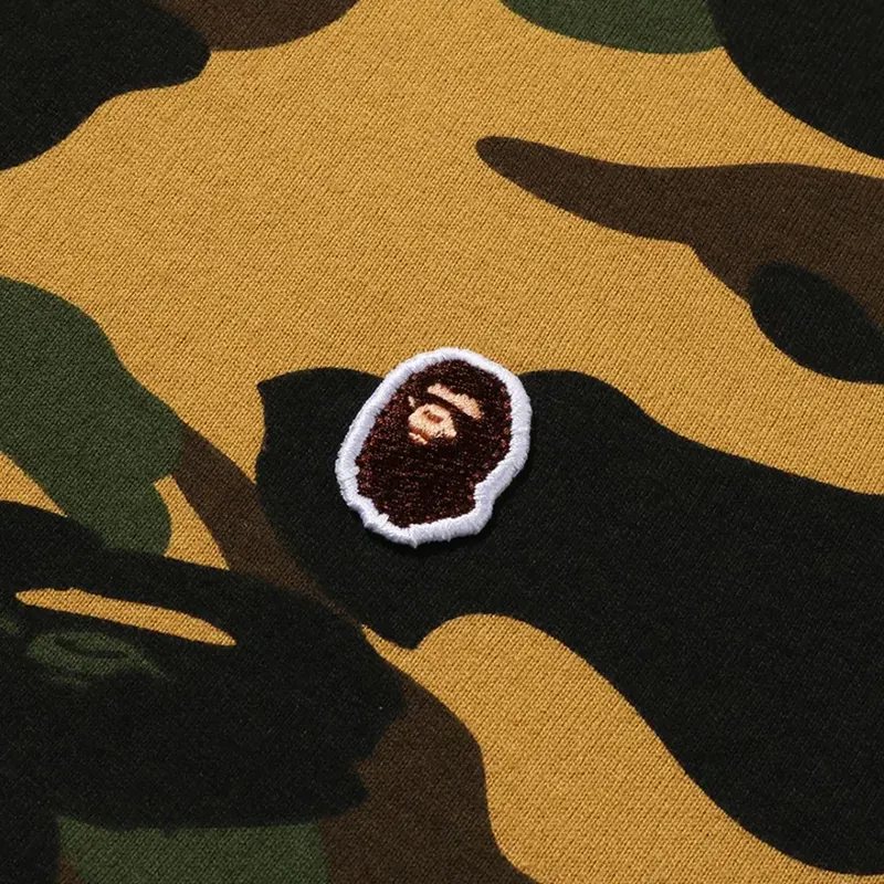 BAPE Yellow Color Camo One Point Tee 2 BAPE Yellow Color Camo One Point Tee <p><strong>BAPE Yellow Color Camo One Point Tee</strong> delivers a casual statement t-shirt look for streetwear outfits, relaxed days, travel, and everyday wear. Its distinctive design offers easy outfit pairing, versatile styling, and standout graphic appeal, making it a strong choice for personal wardrobes, collections, or gifting.</p>
