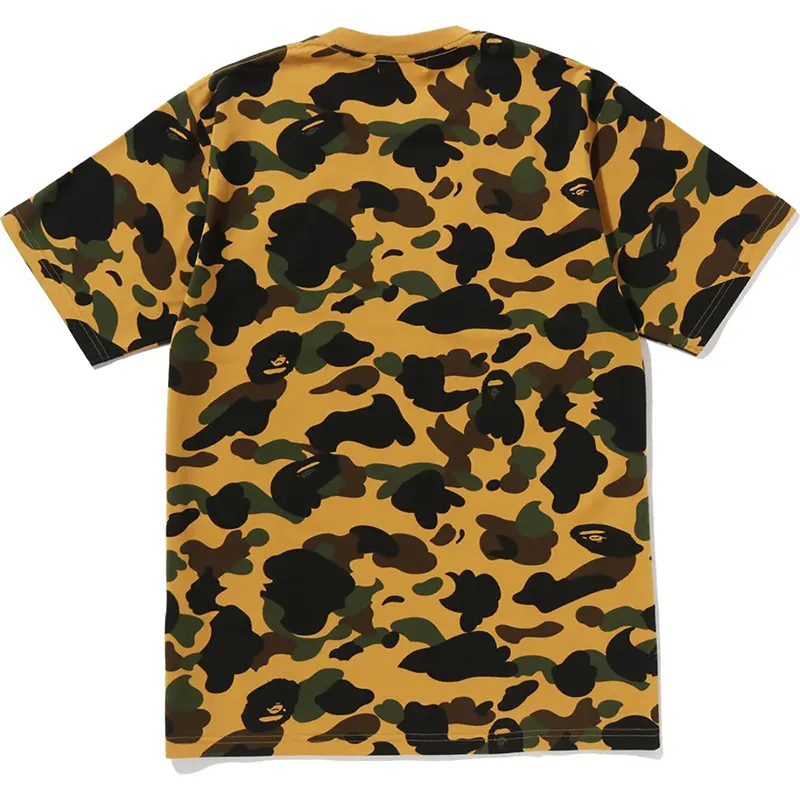 BAPE Yellow Color Camo One Point Tee BAPE Yellow Color Camo One Point Tee <p><strong>BAPE Yellow Color Camo One Point Tee</strong> delivers a casual statement t-shirt look for streetwear outfits, relaxed days, travel, and everyday wear. Its distinctive design offers easy outfit pairing, versatile styling, and standout graphic appeal, making it a strong choice for personal wardrobes, collections, or gifting.</p>